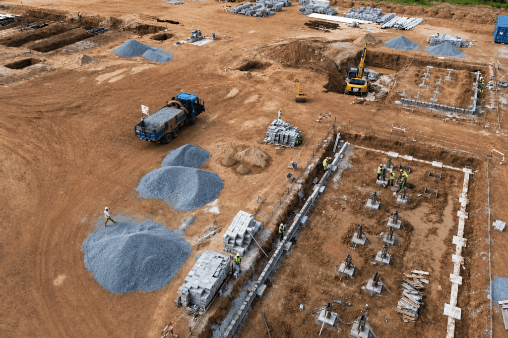 Comparatif des matériaux construction Bénin : béton, latérite et acier